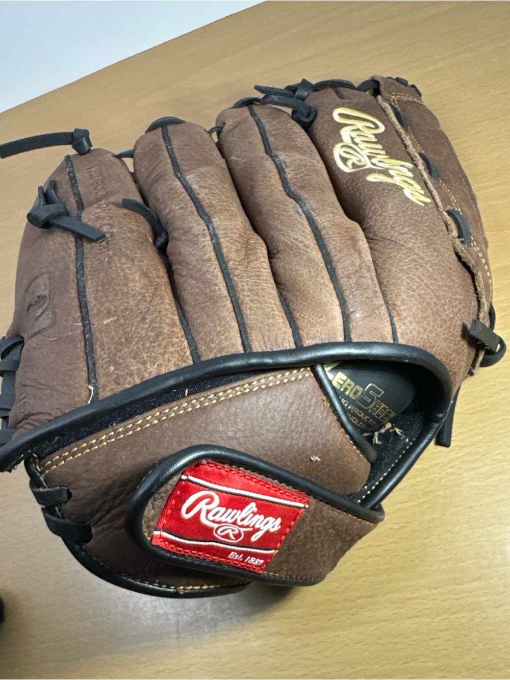 Rawlings Brown and Black Leather Baseball Glove with Red Patch